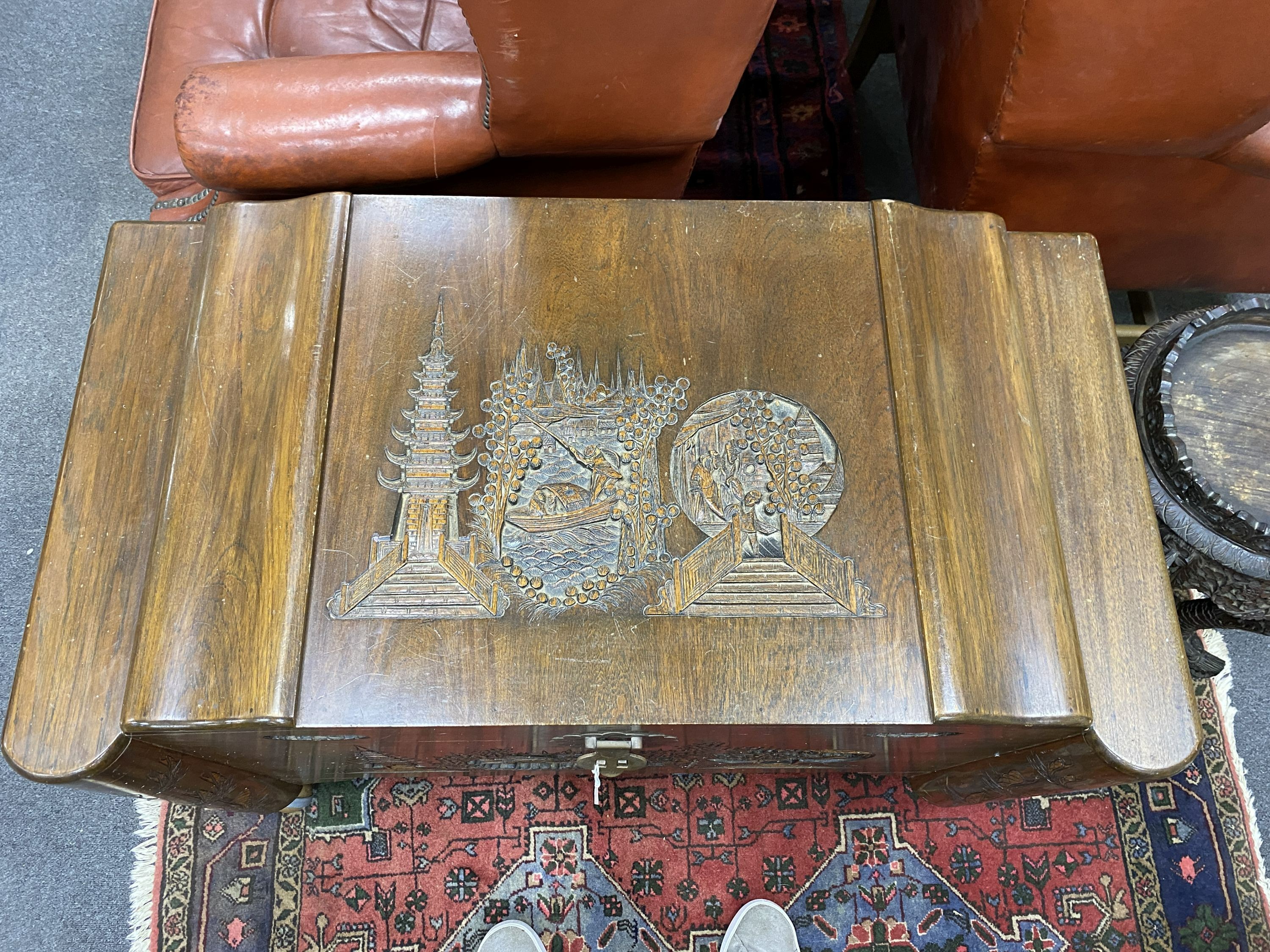A Chinese carved teak and camphorwood lined chest, length 100cm, depth 54cm, height 64cm